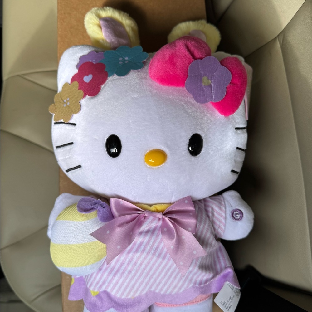 Hello Kitty Easter animated greeter with Pink, Purple, and Yellow Accents